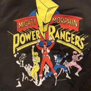 A black long sleeve tee with the power rangers.